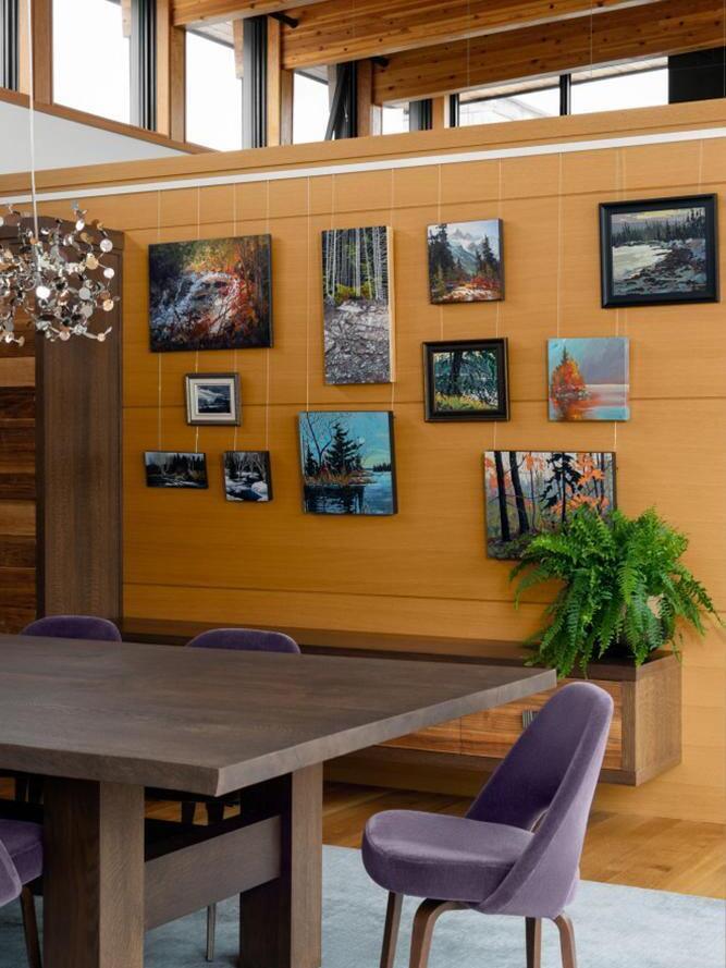 Small silver disc cluster near a gallery wall of framed pictures