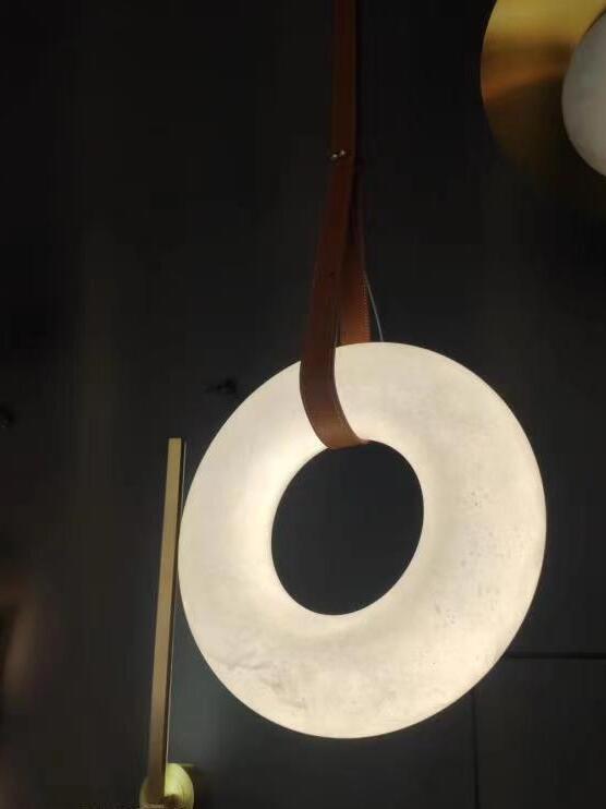 Illuminated upright White ring on Brown strap
