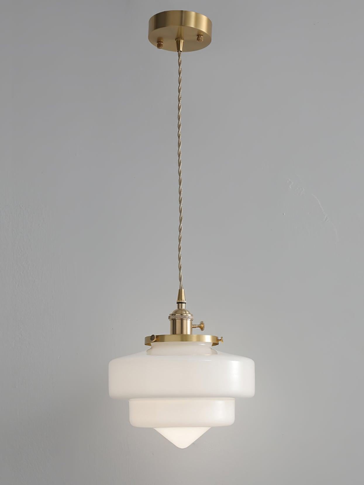 Atlas Model A single pendant with round brass canopy, twisted-looking cord, flat white glass tiers and pointed bottom