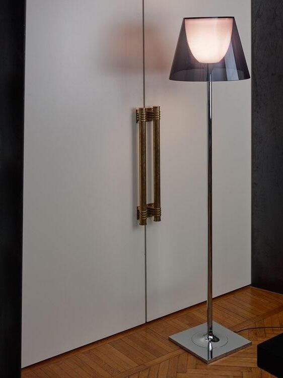 Ktribe smoky-looking outer shade beside a cabinet