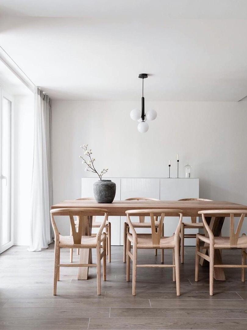 White globe cluster above a rectangular dining table