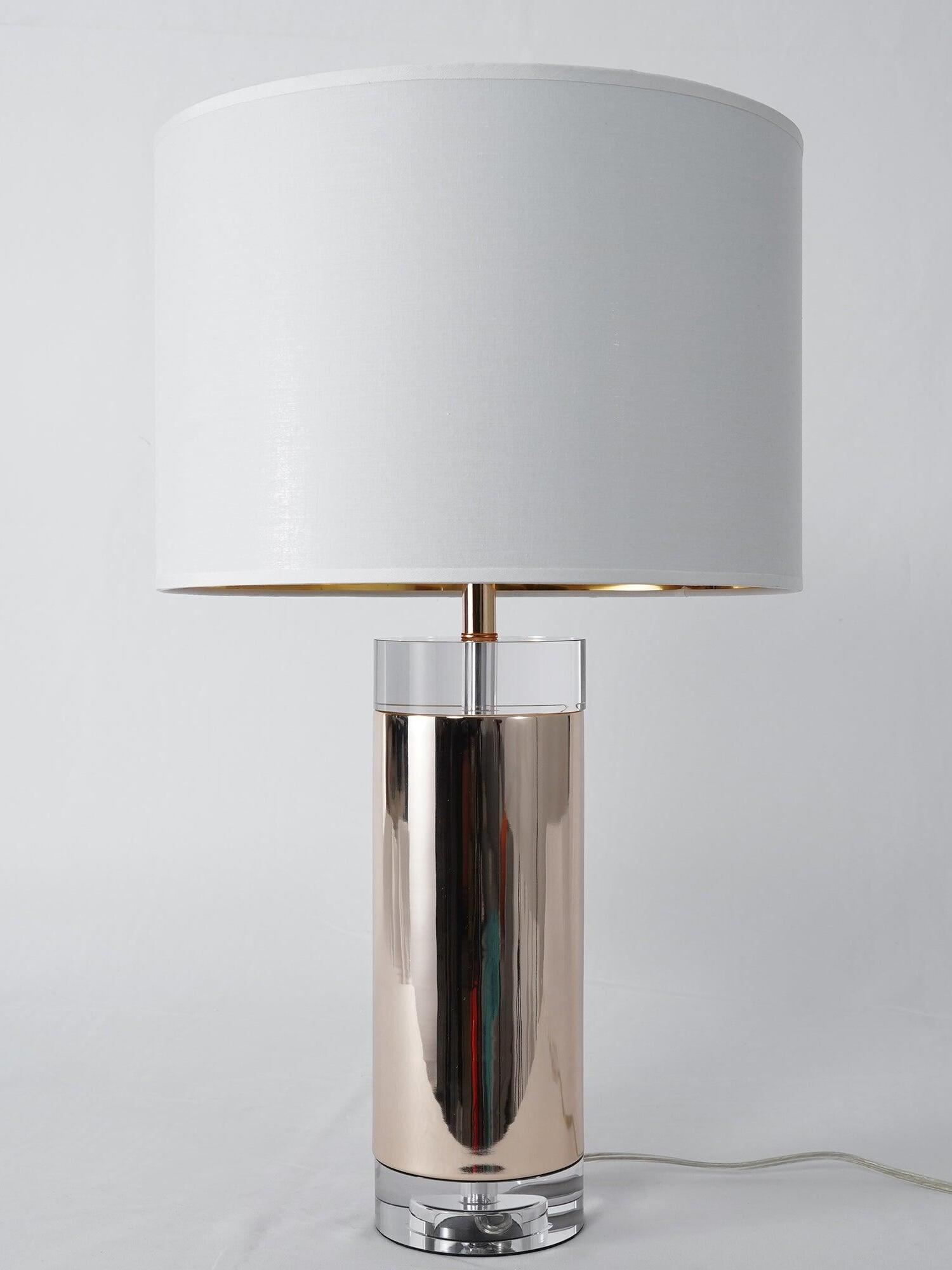 Alternate view of reflective cylinder lamp with white drum shade and trailing cord