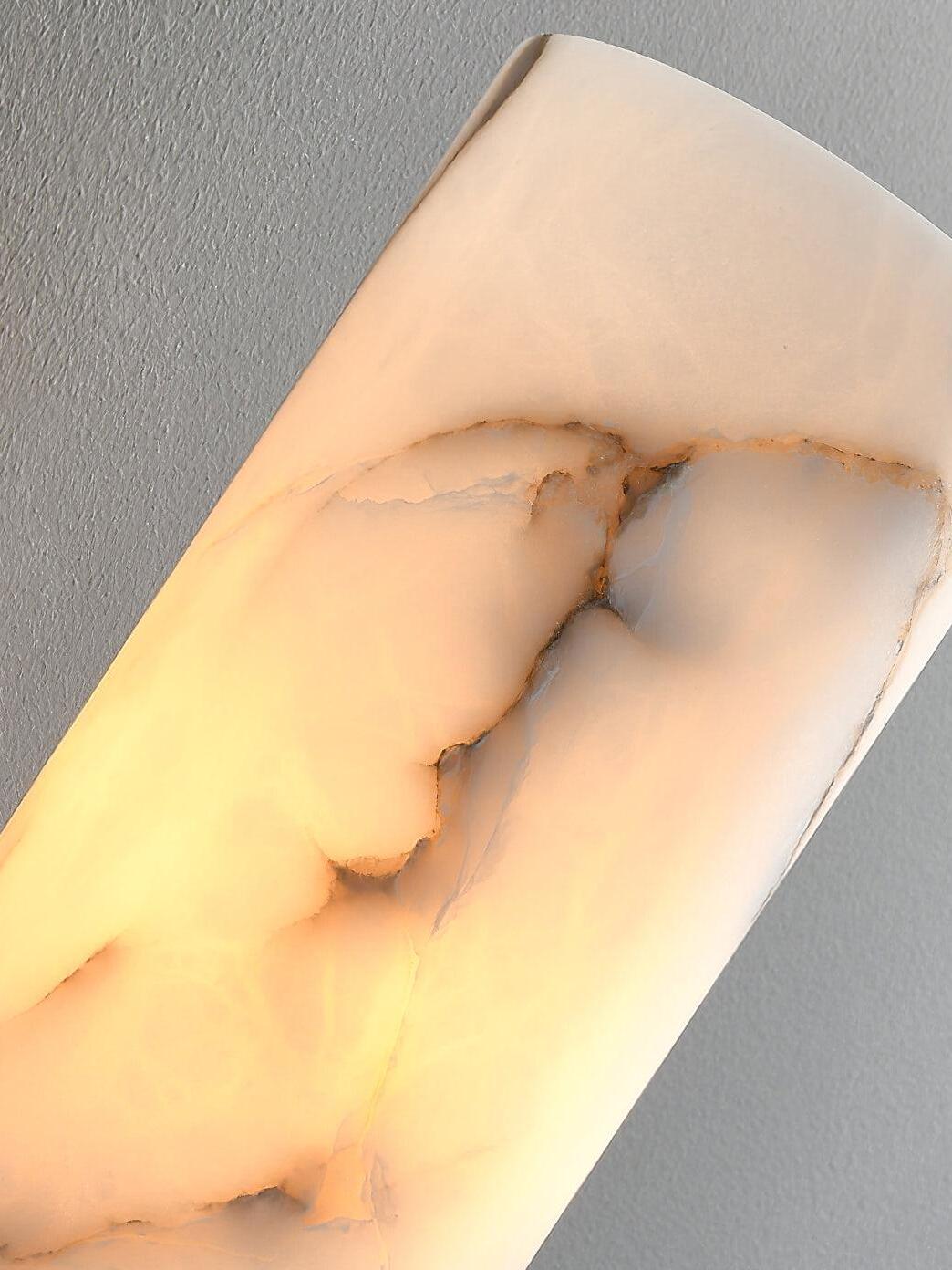 Close illuminated veining in white marble shade