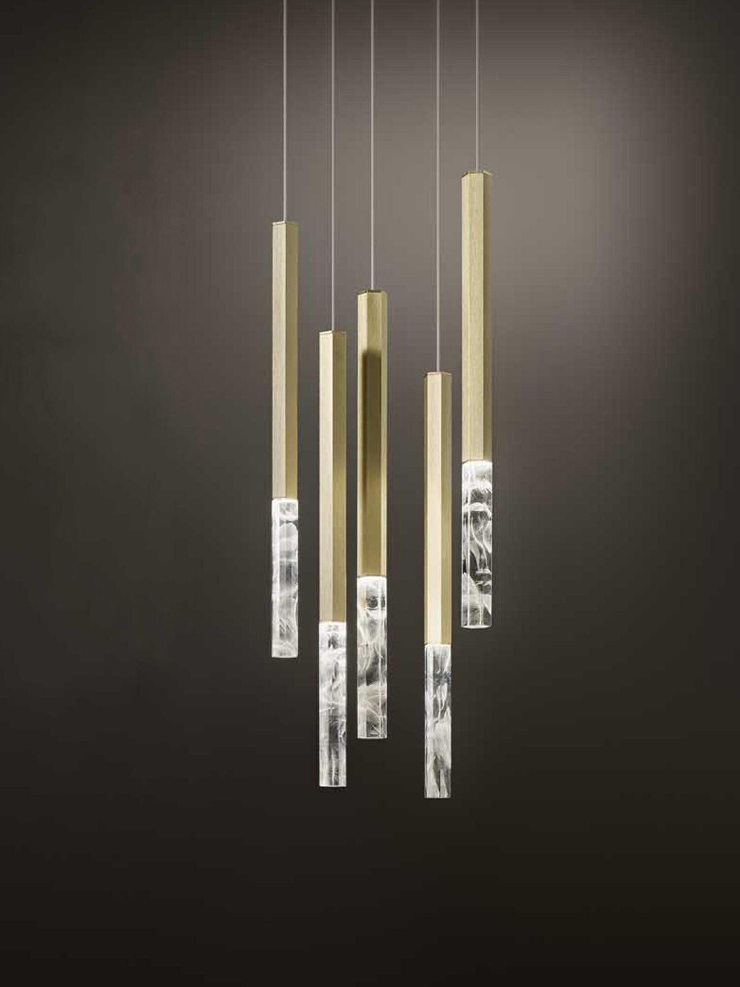 Gold five-head crystal pendant arranged at staggered heights