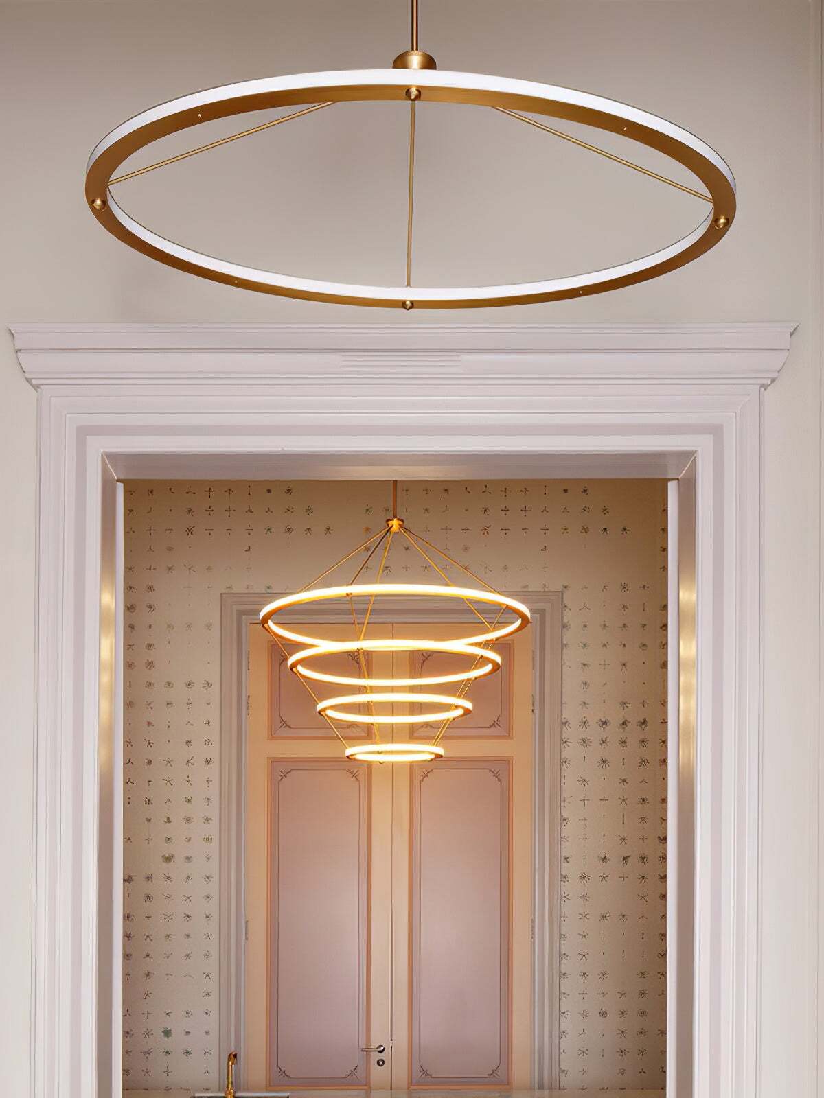 Foreground ring pendant with several separately hung rings behind