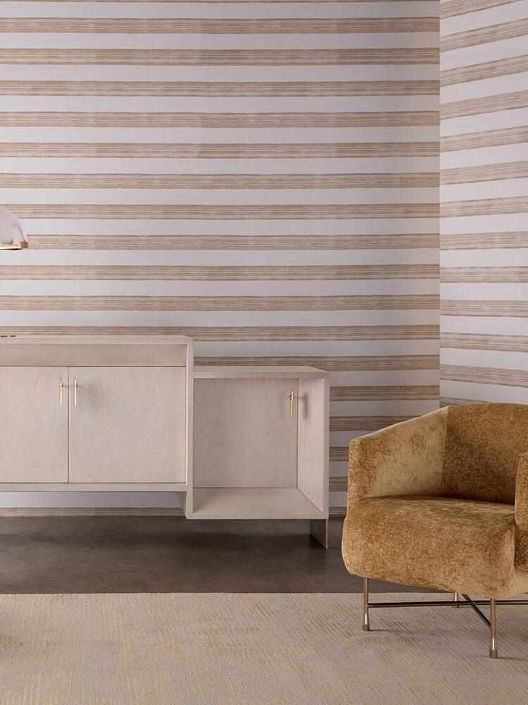 Dome table lamp in a striped-wall room