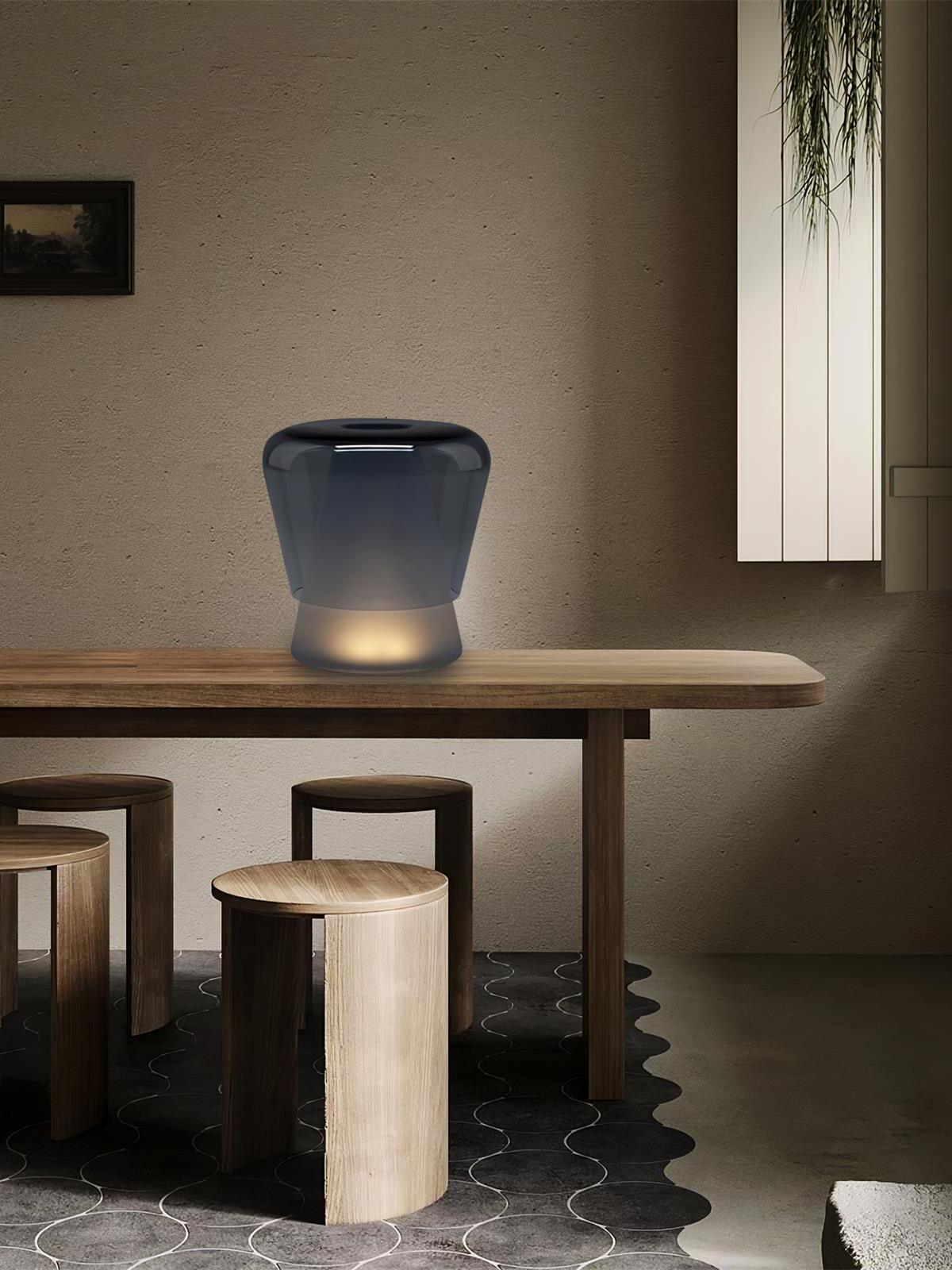 Blue Jumelle lamp on long wooden table