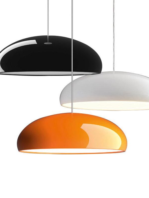 Black white and orange dome group on a plain background