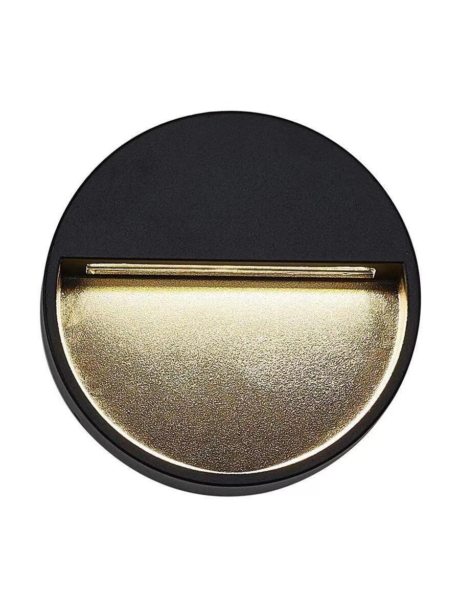 Front view of black round half-moon light