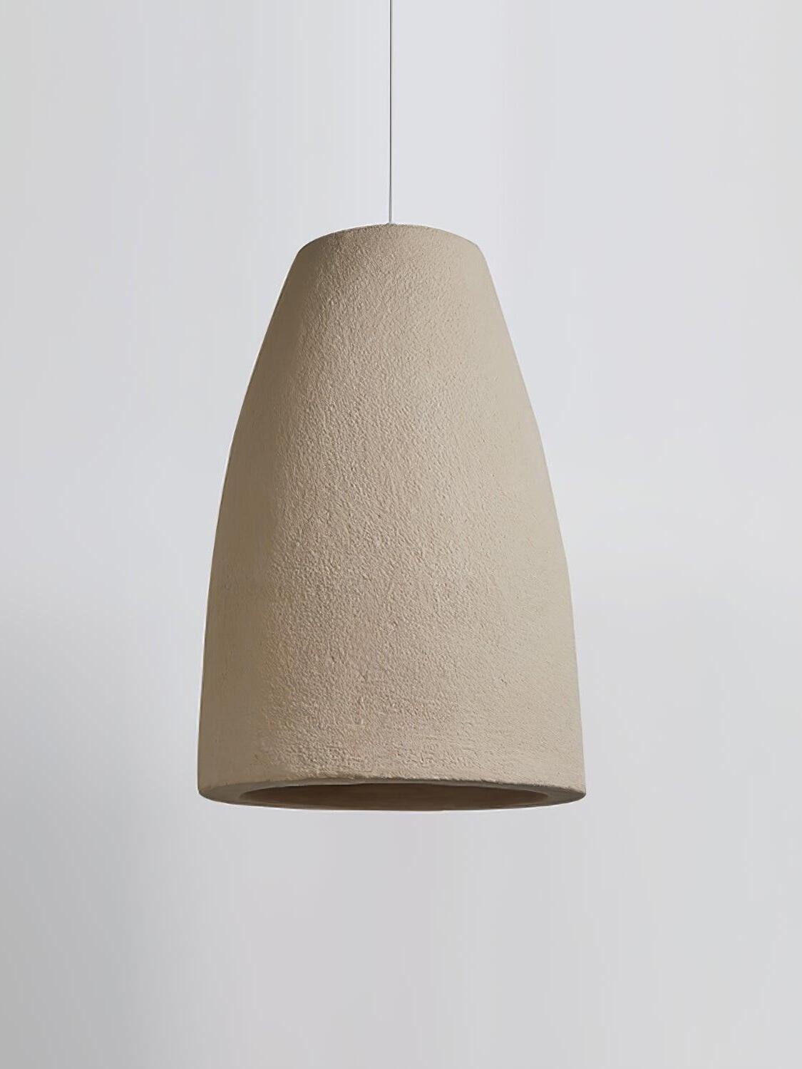 Unlit wide tapered shade on a thin cord with rough pale surface and dark lower opening
