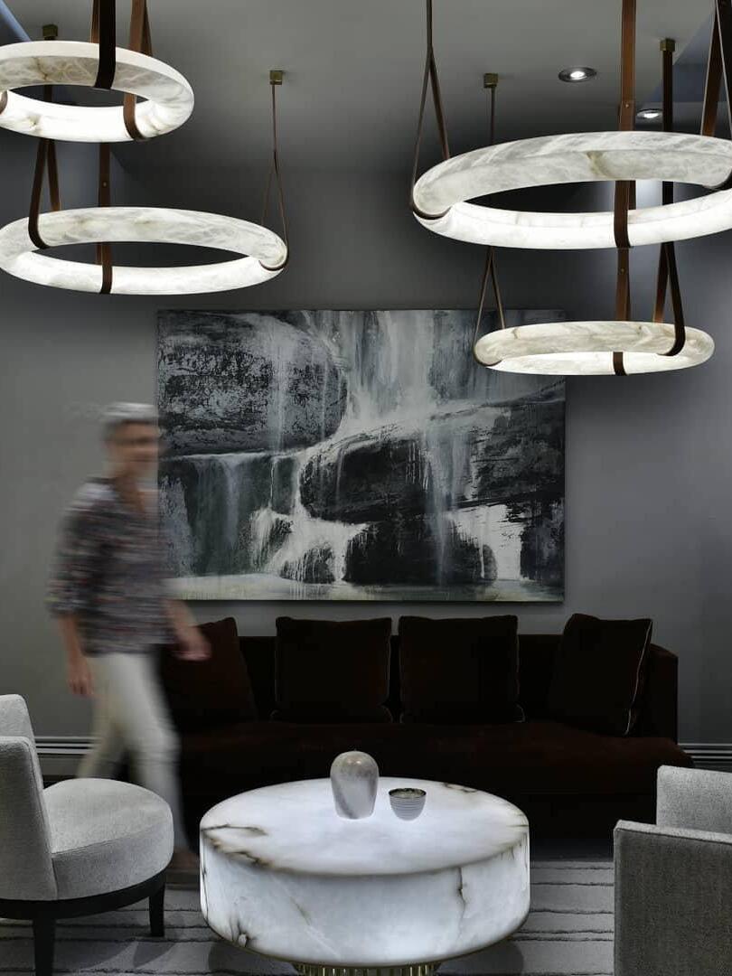 Illuminated alabaster rings over seating