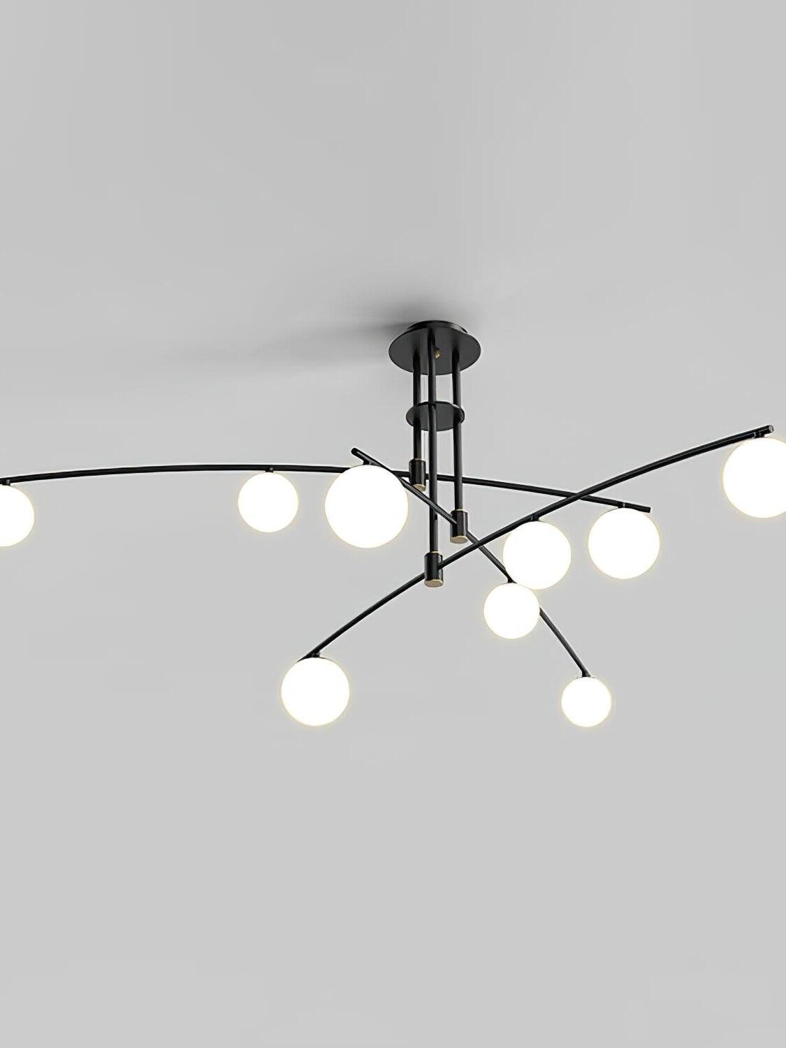 Black Long Arm chandelier with nine white glass globes on crossing curved arms