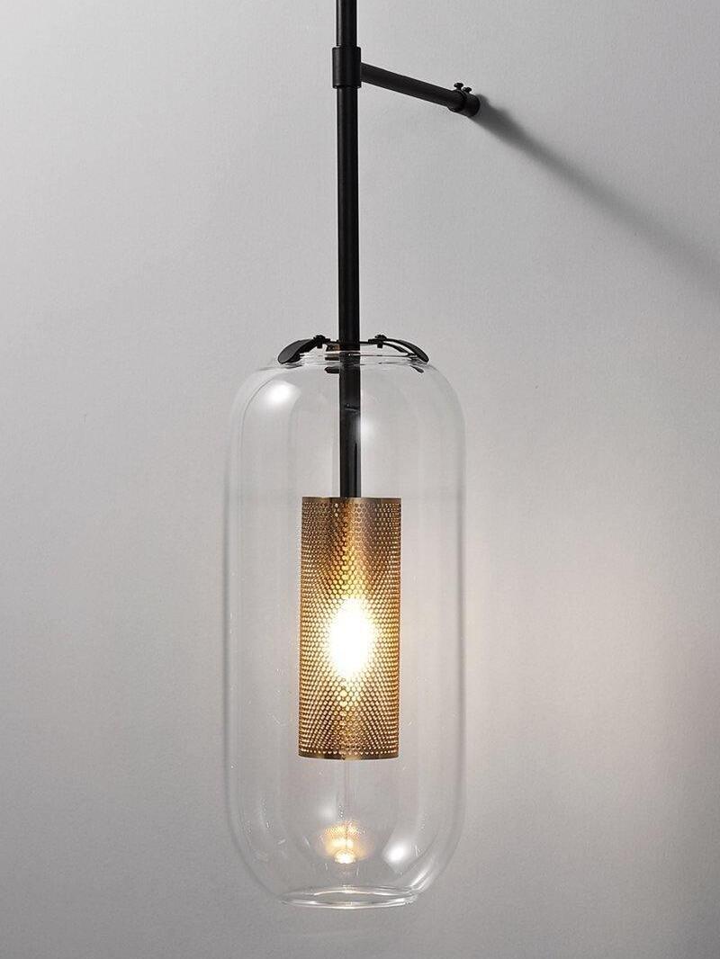 Black vertical rod, side support and glass capsule with a glowing perforated inner sleeve