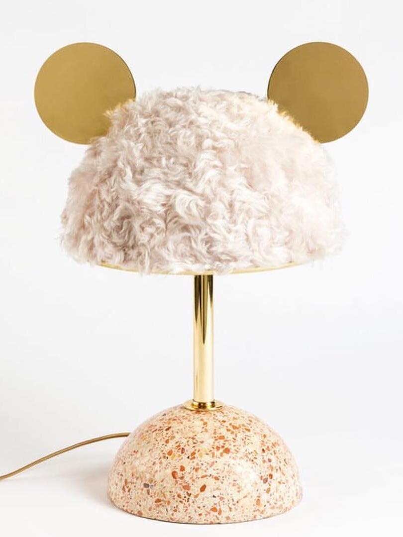 Pale plush domed shade with gold-tone discs and warm-toned speckled base