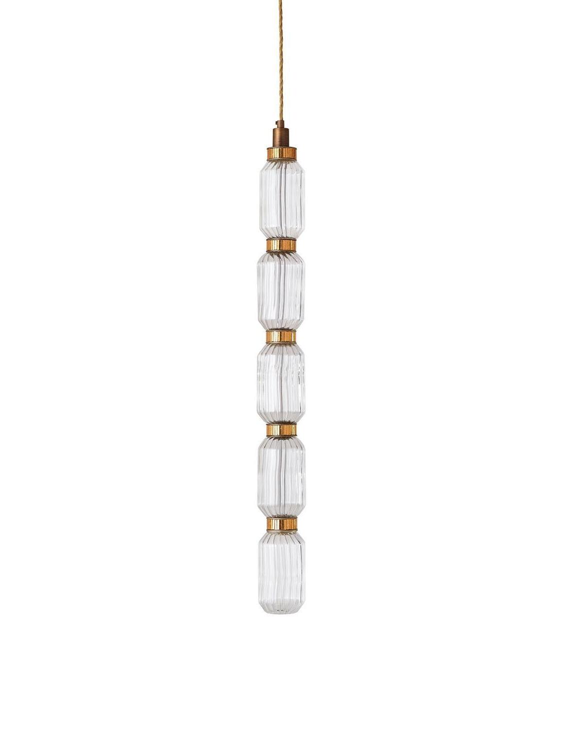 Long narrow pendant of four ribbed clear glass sections