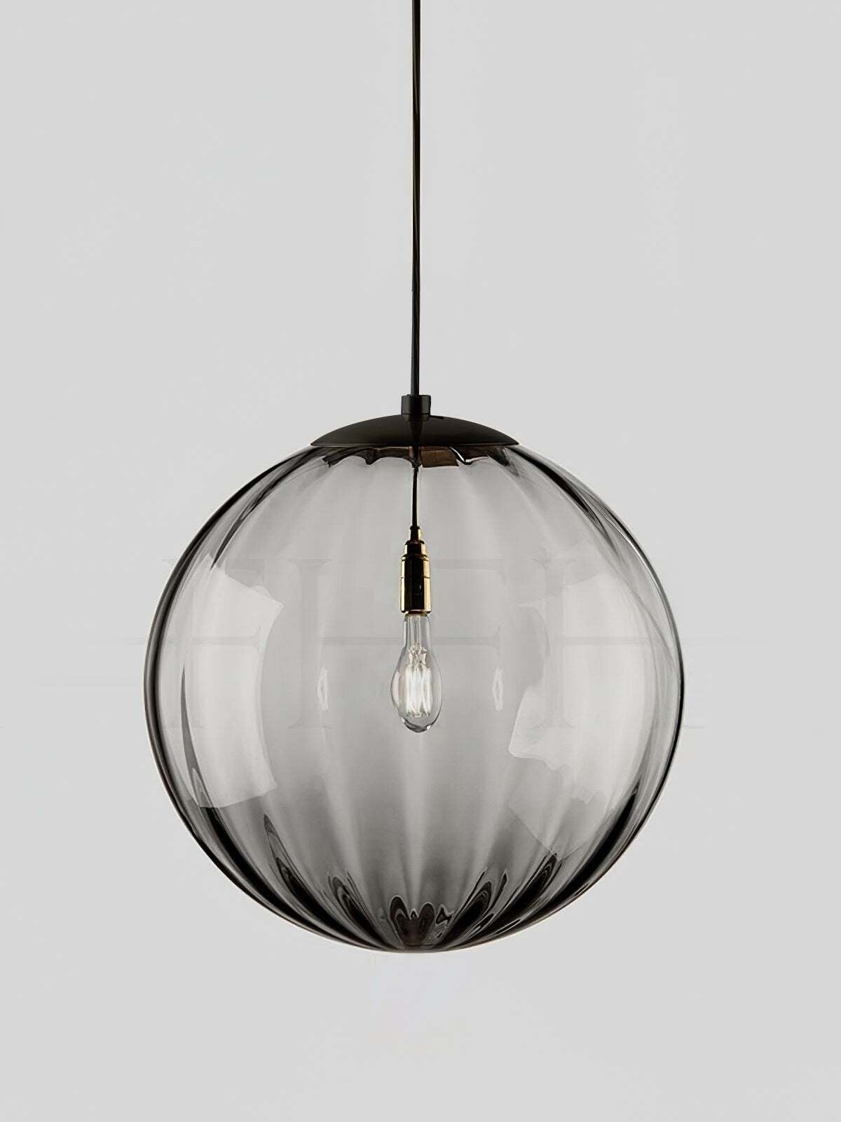 Smoke gray Paola glass globe with vertical fluting and a visible bulb