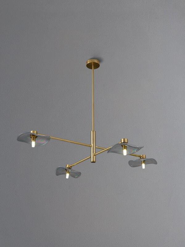 Gold four-light Calla chandelier shown in gallery
