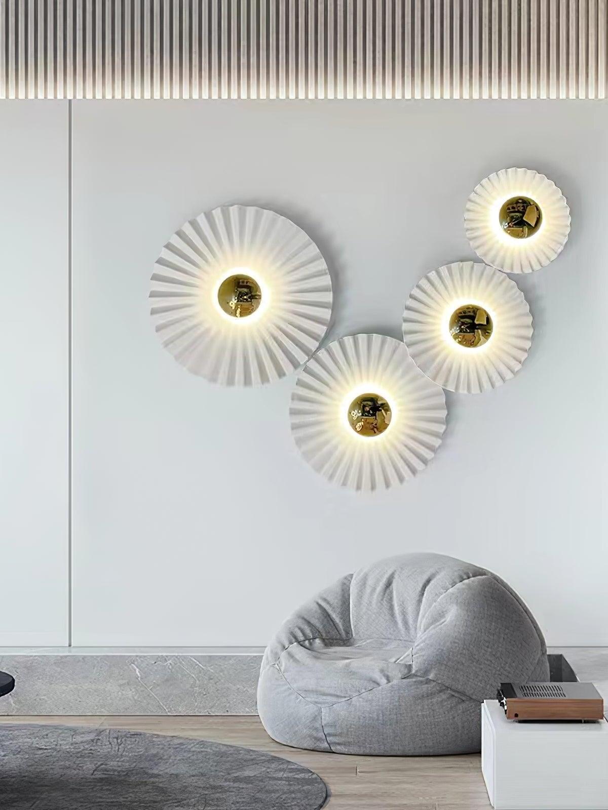 Four pleated discs in pale living room