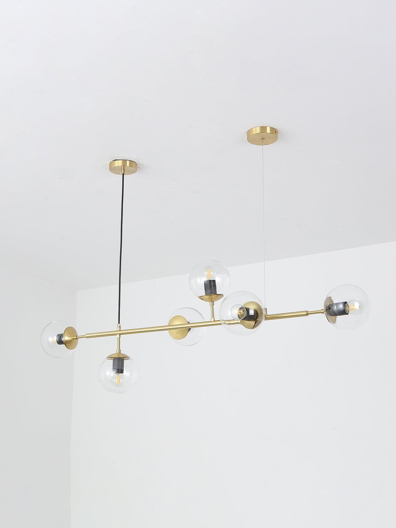 Brass-coloured Orb frame with clear globes