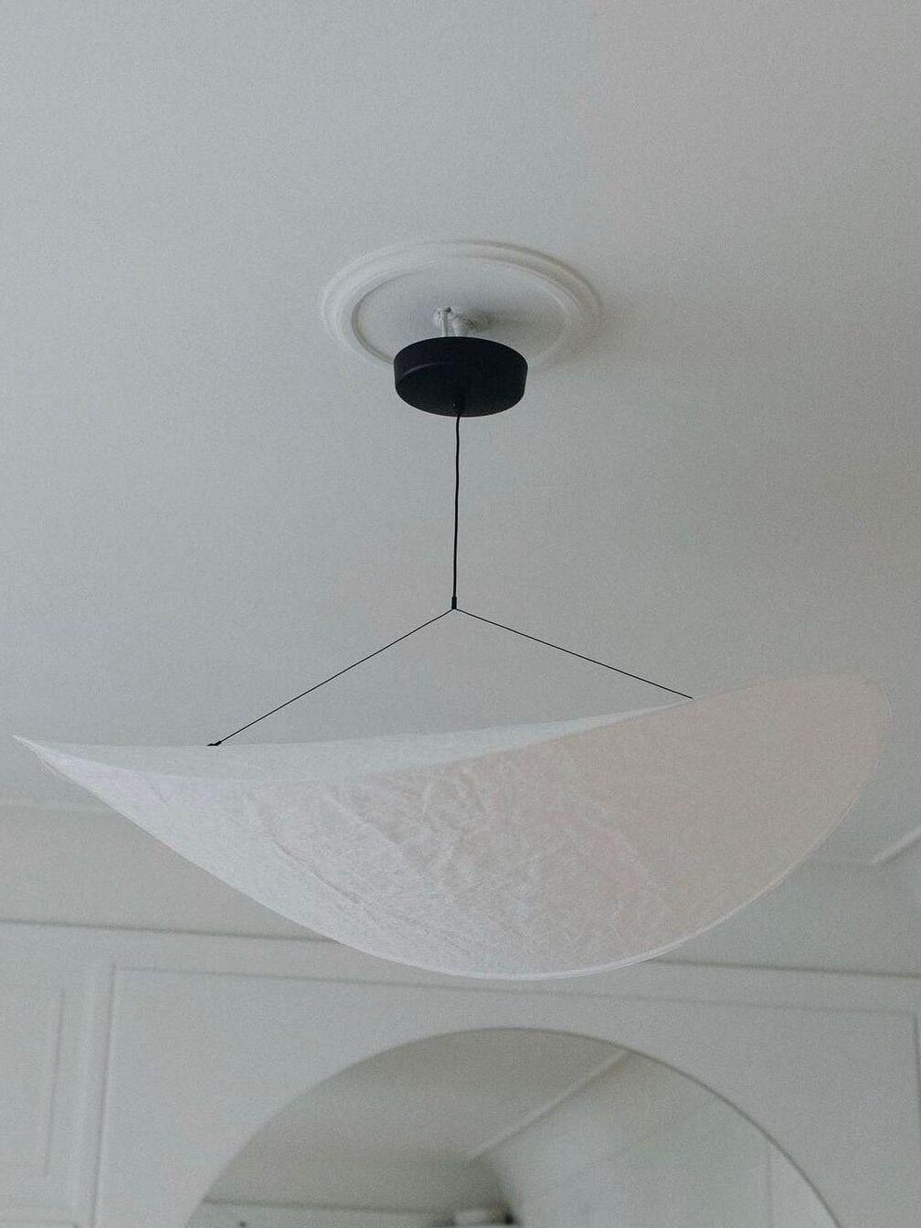 Tense with black round canopy and thin suspension