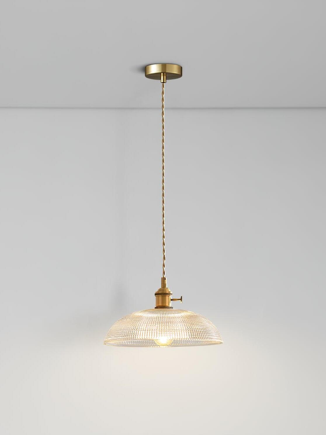 Lit glass pendant with round ceiling canopy