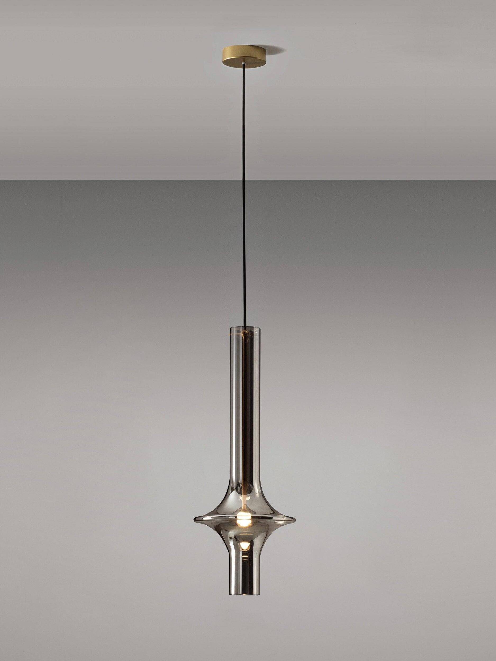 Single smoky flared glass pendant with gold-tone central stem, round gold-tone canopy and black suspension cable