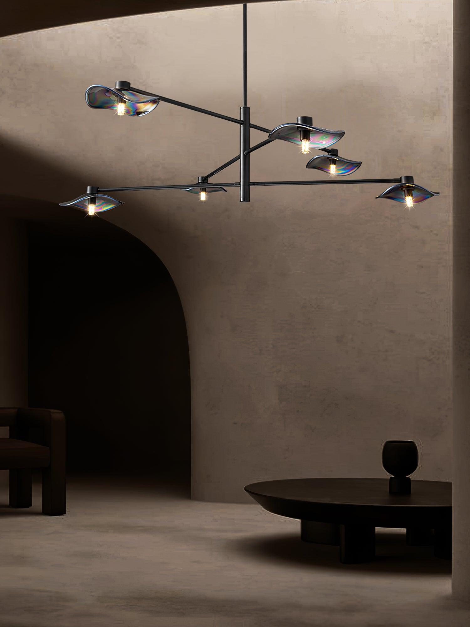 Black glass chandelier above a round table