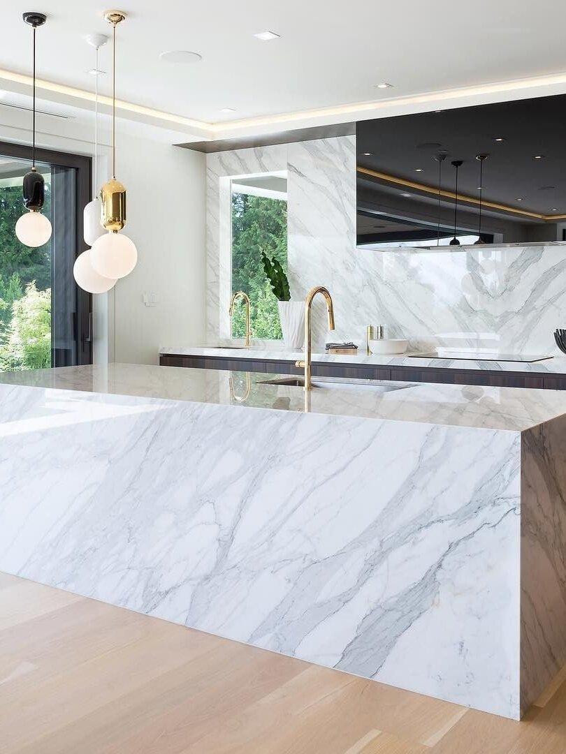 White globe pendants in a bright kitchen scene