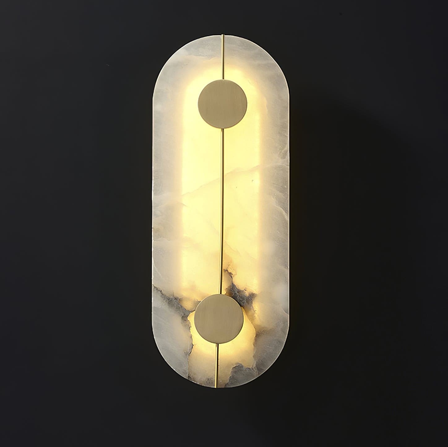 Lit oval stone wall lamp against a dark background