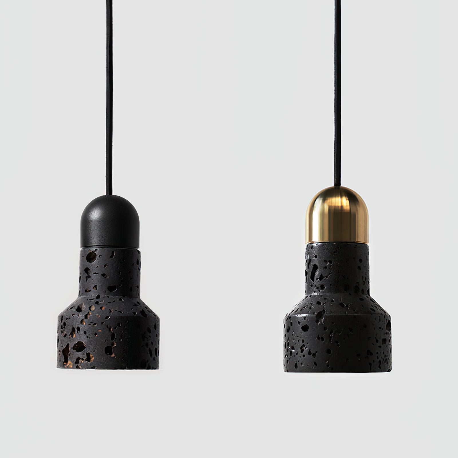 Gold-cap and black-cap versions of the textured pendant side by side