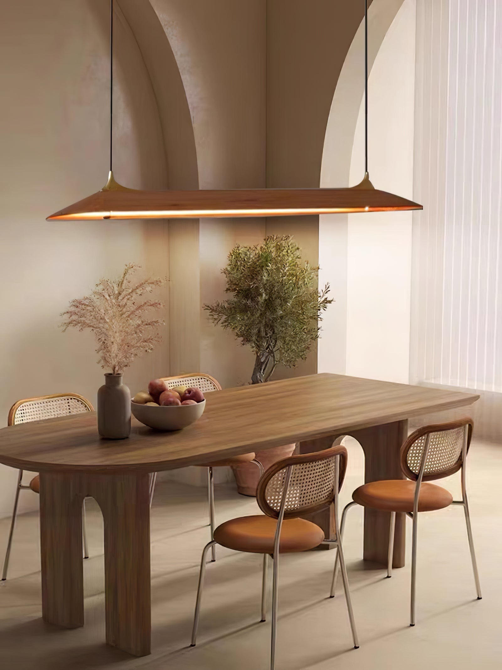 Mernoe pendant above a long wooden dining table
