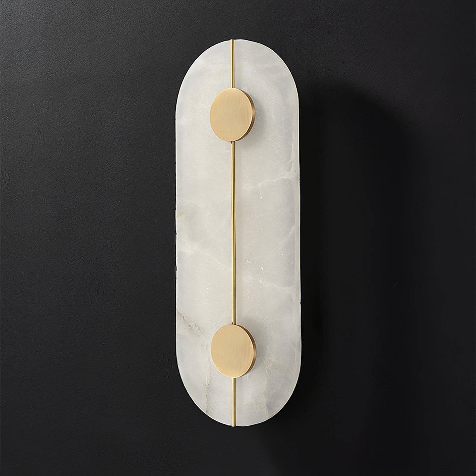 Unlit oval stone wall lamp with brass discs and central line
