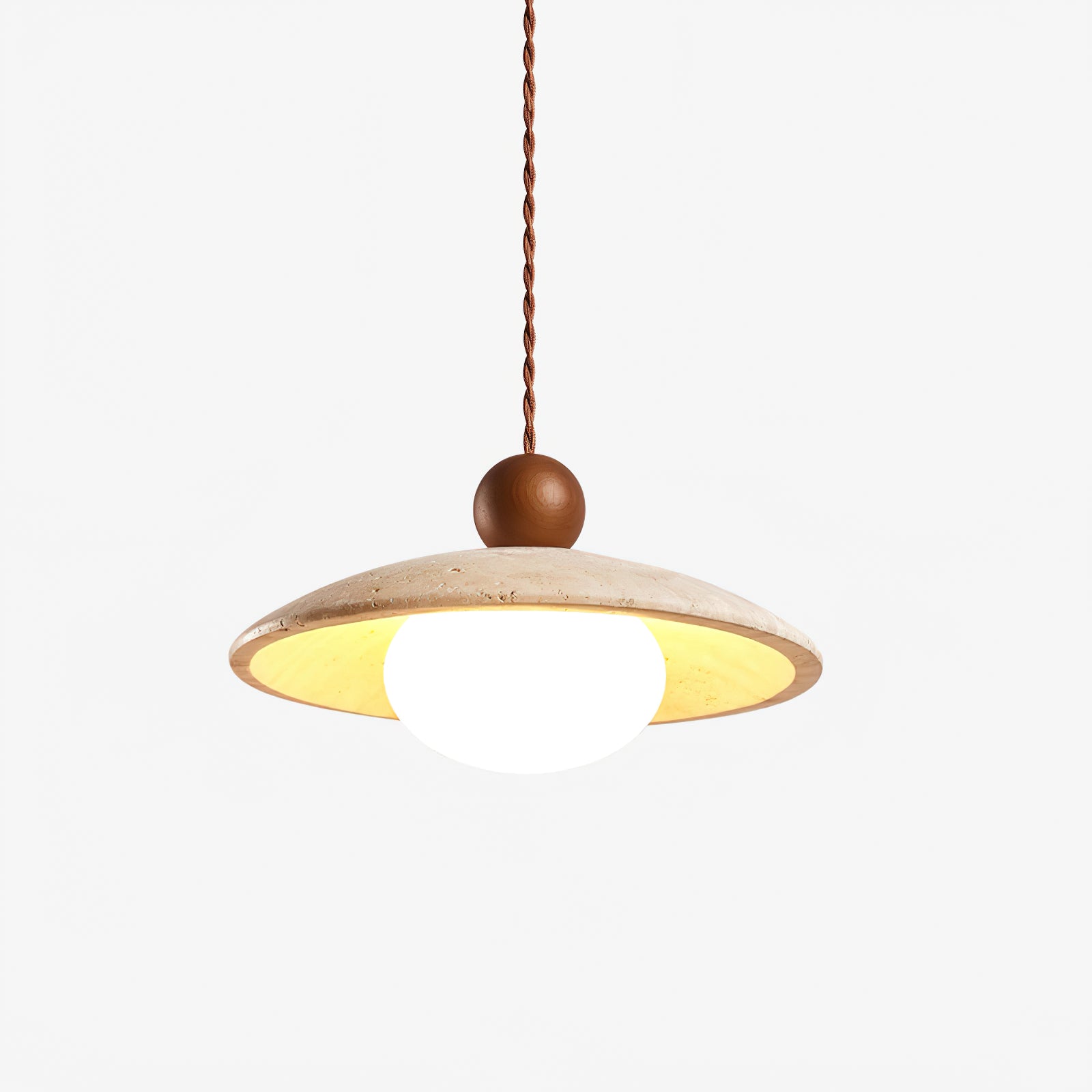 Underside view of lit stone disc pendant with dark wooden sphere