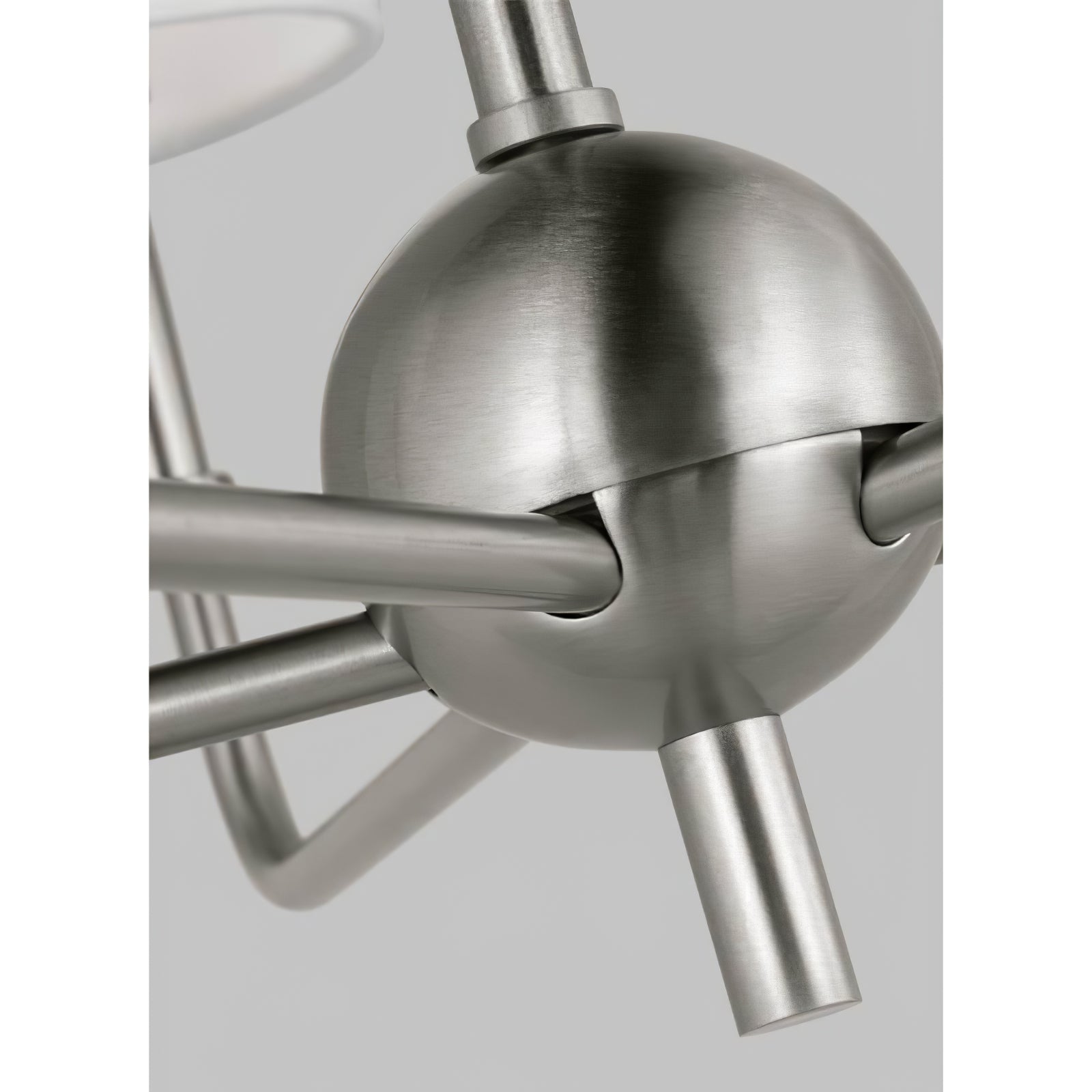 Brushed Nickel Foxdale central joint and curved-arm detail