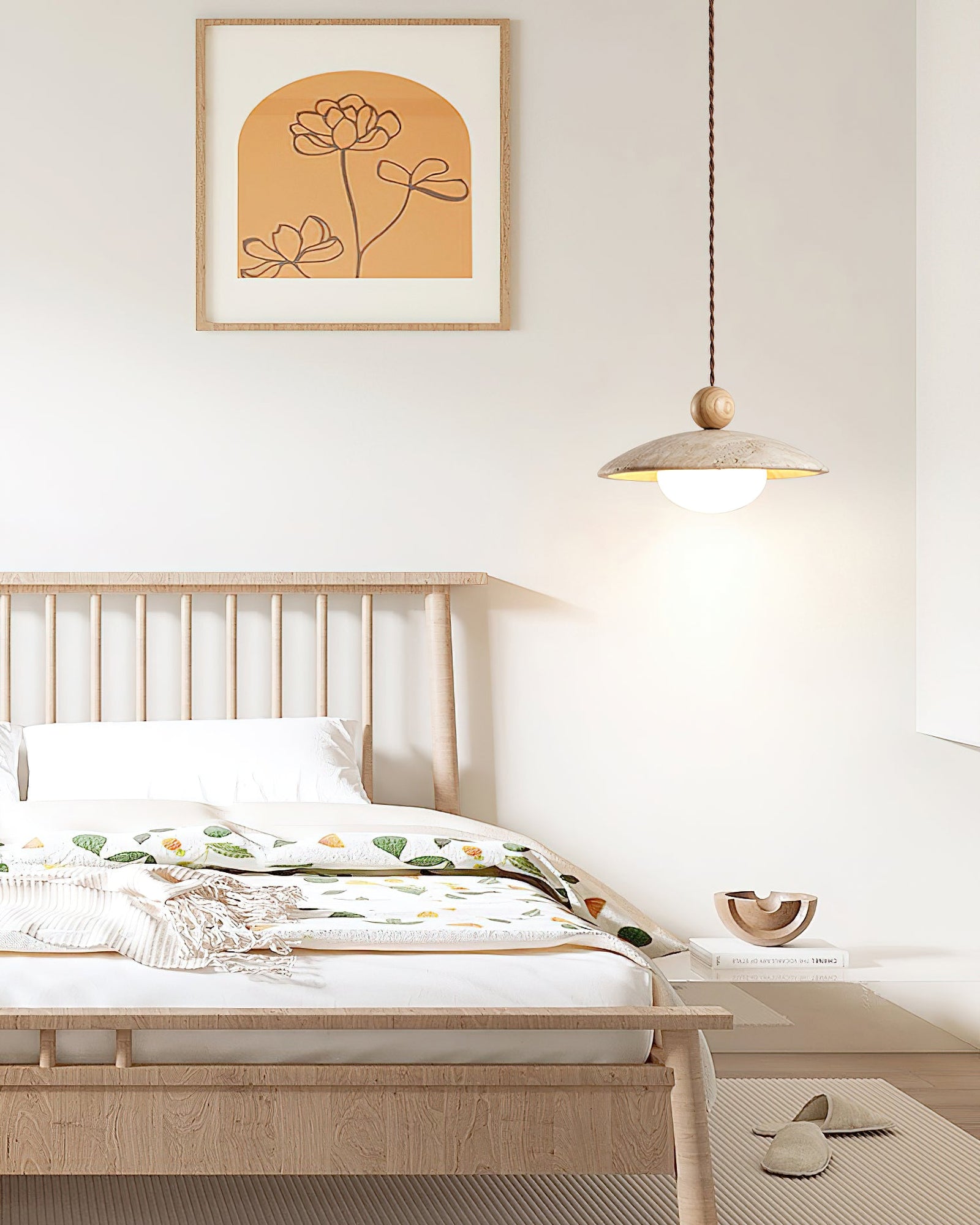 Light wood-sphere pendant beside a wooden bed