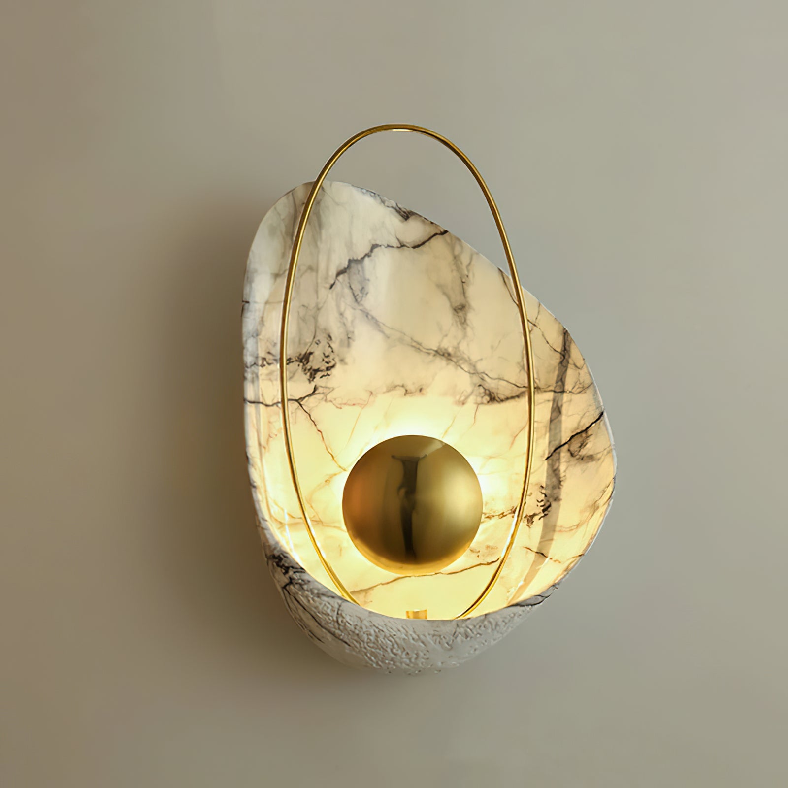 Warm-looking illuminated shell wall lamp with grey veining