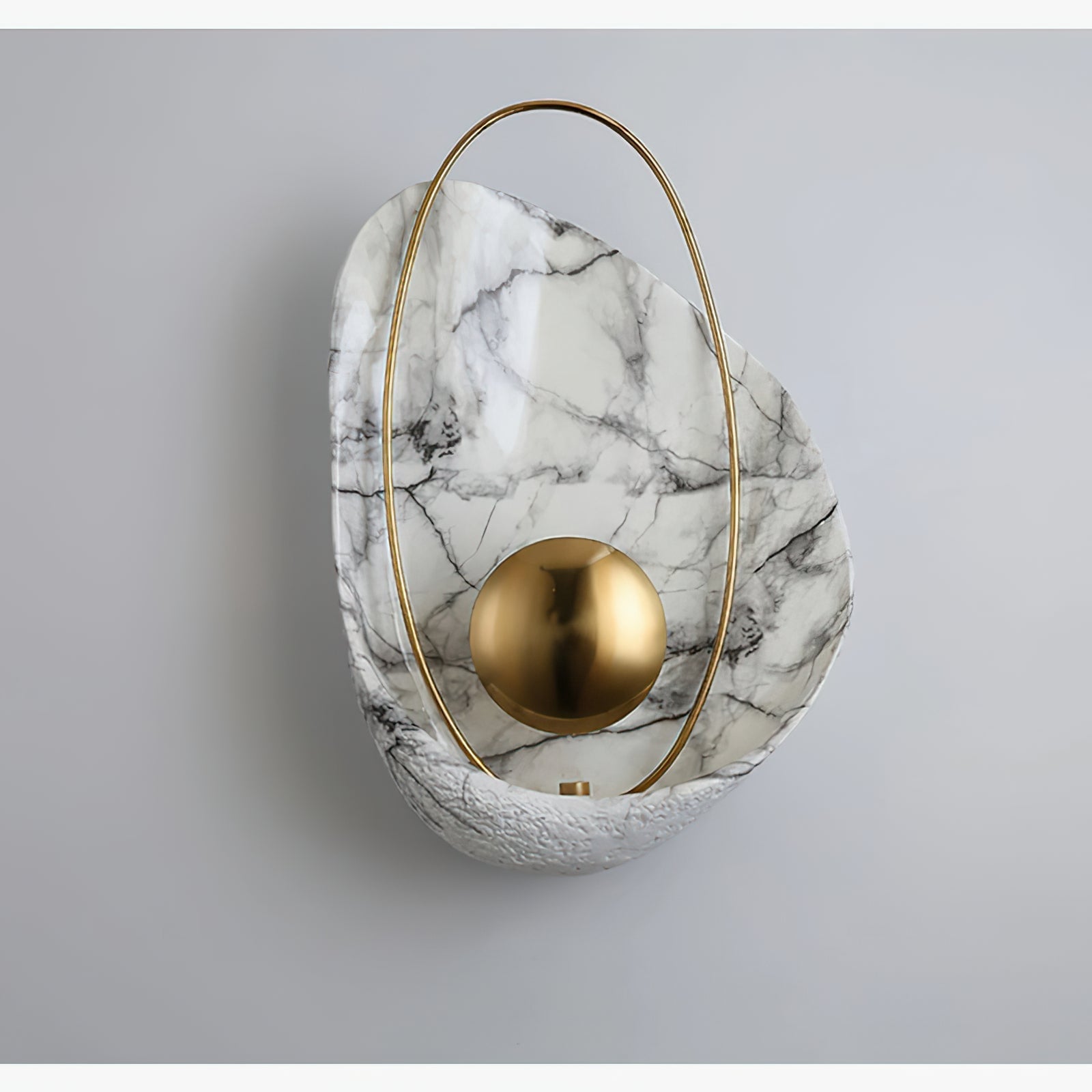 Angled unlit shell lamp with a gold-coloured rounded centre
