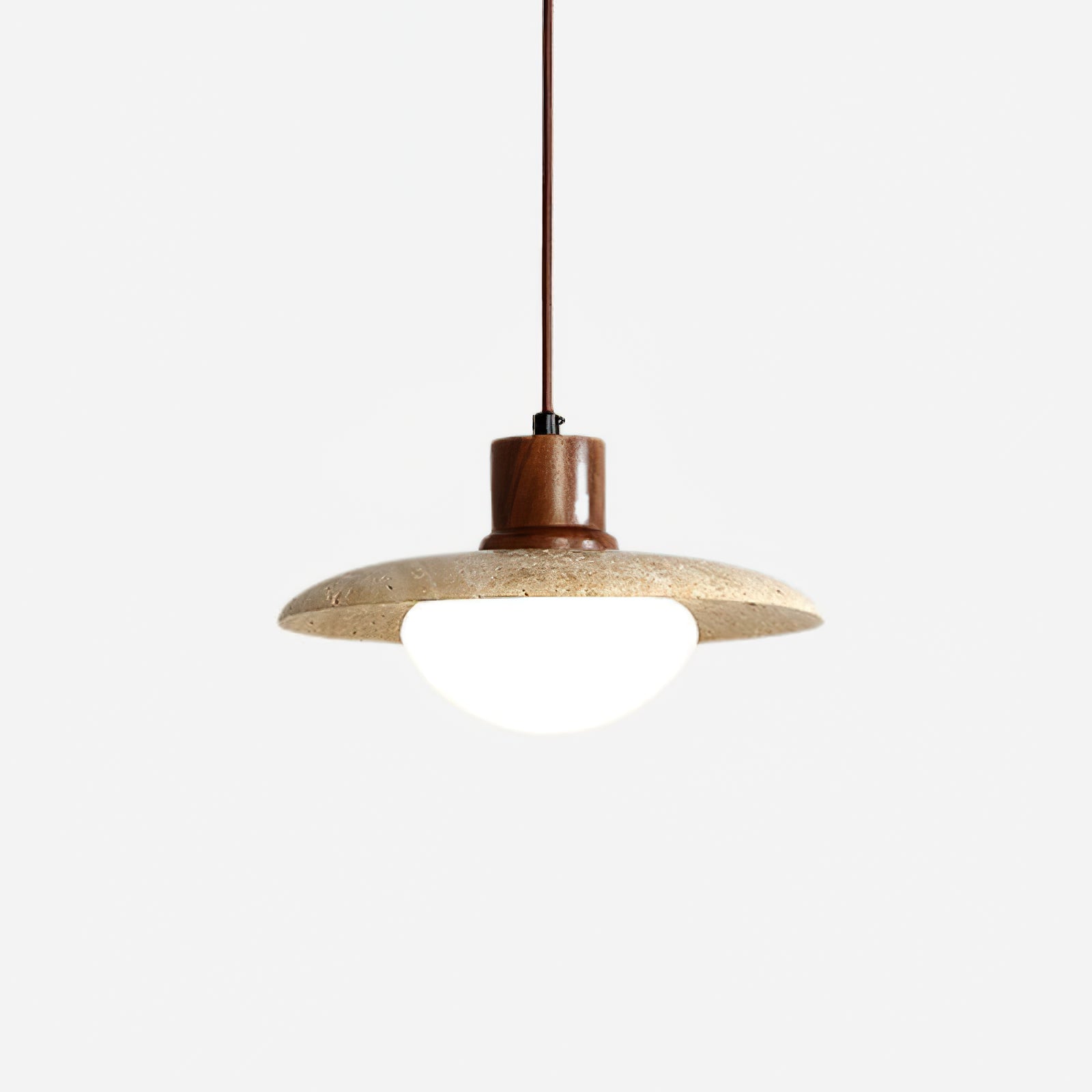 Close view of stone disc, rounded diffuser and brown top fitting
