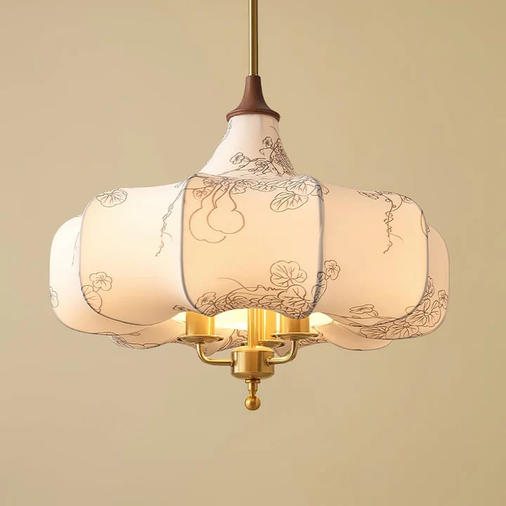 Close view of floral outlines across the pale rounded fabric shade