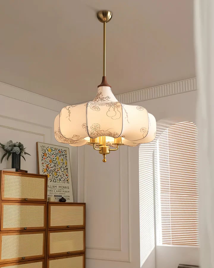 Floral-patterned Aurora Bloom pendant in a room with a low cabinet