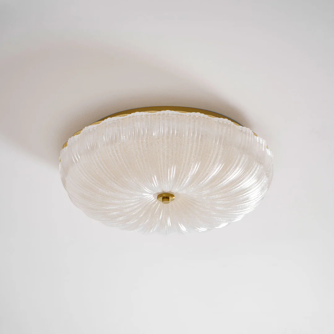 Unlit-looking frosted glass ceiling light and gold centre