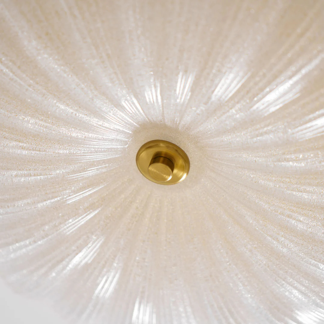 Close-up of textured glass ribs and central finial