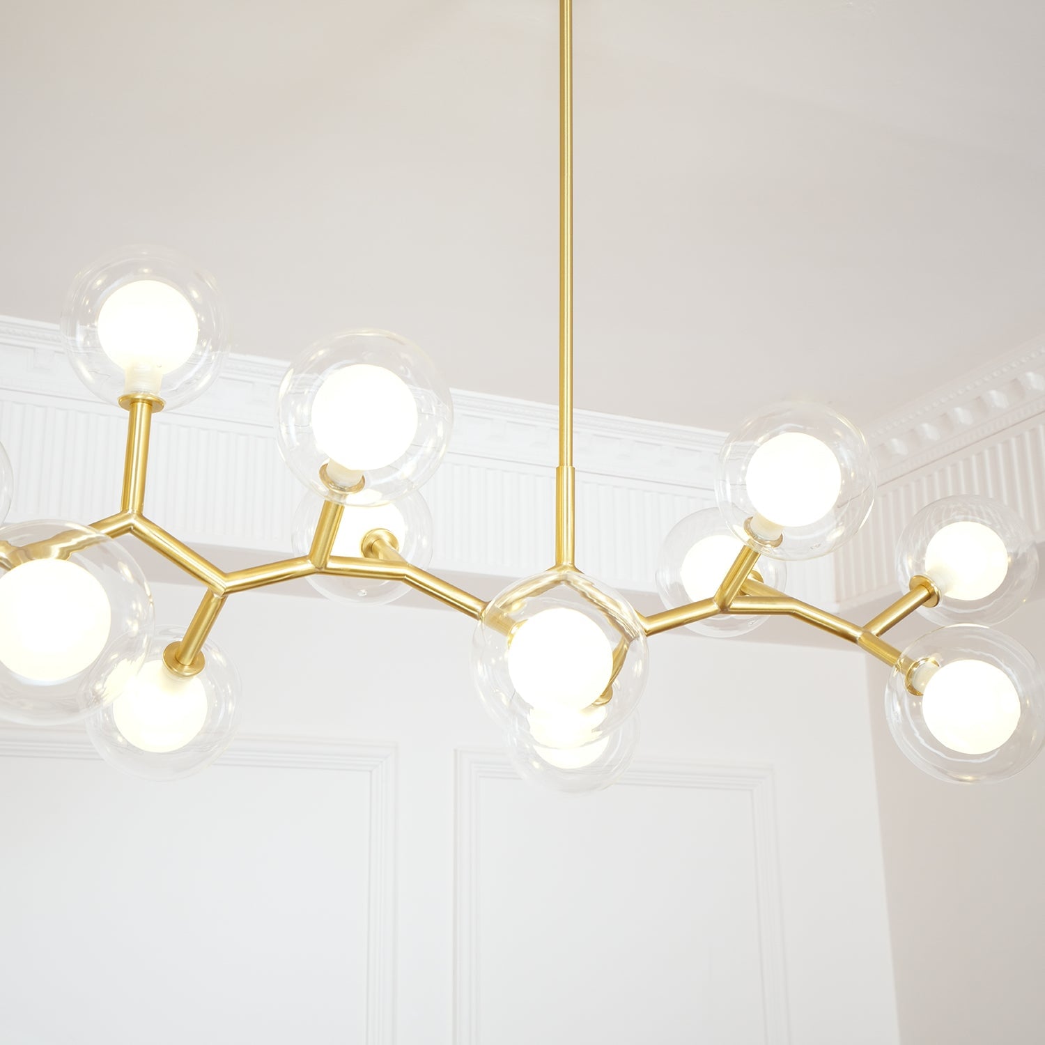 Illuminated white centres inside clear glass globes